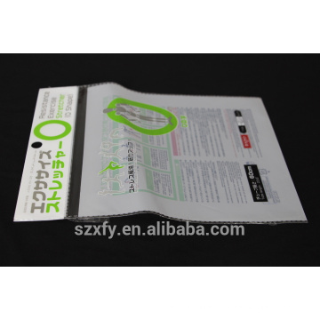 Self adhesive plastic bag with header and printing